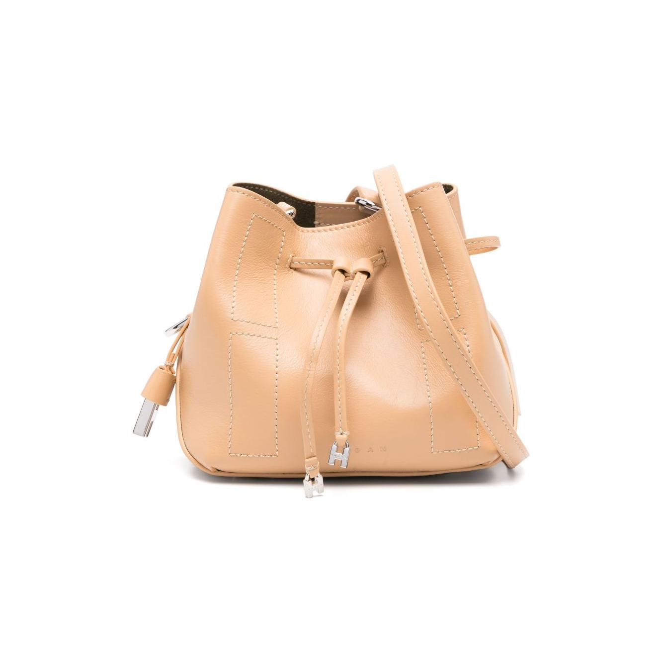Front view with bag zipped and handles upright.
