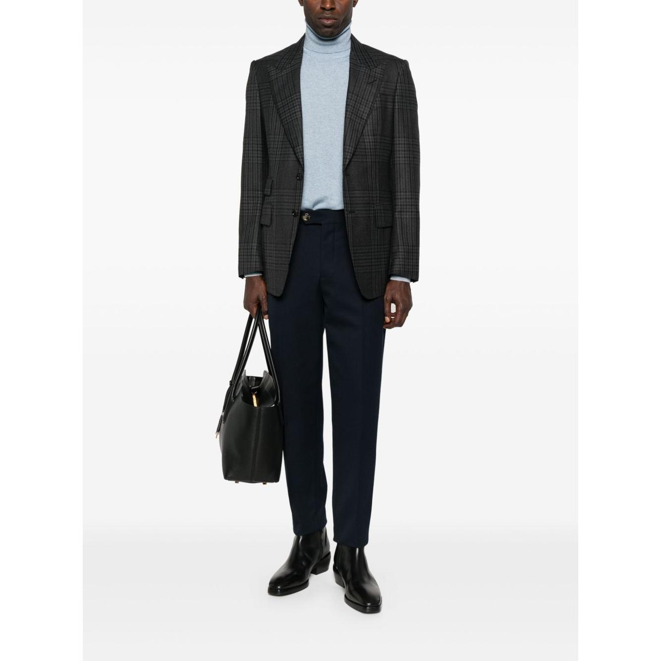 Front view with bag zipped and handles upright.