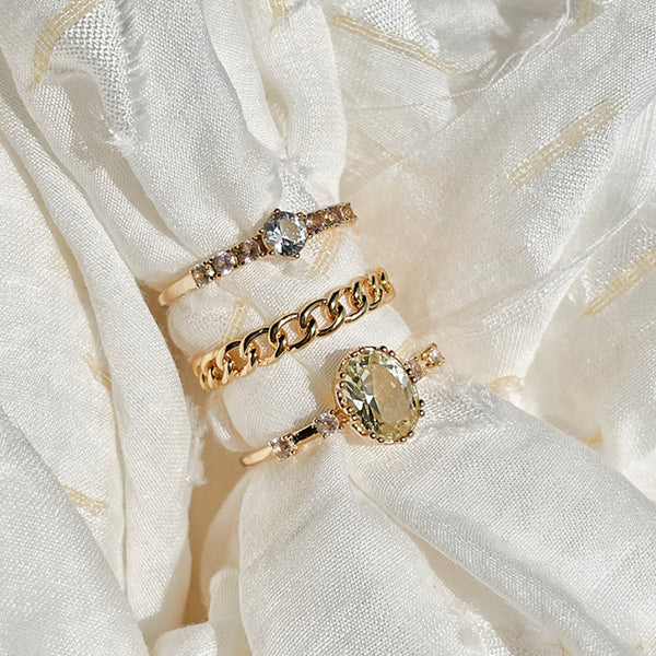 24KAE JEWELS JEWELRY Mod. 12401Y/56 gold rings displayed on white fabric