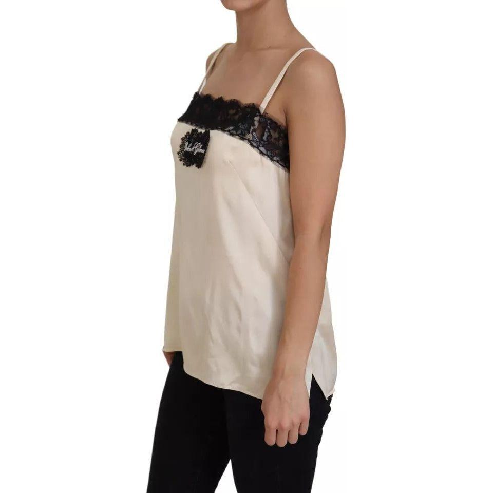 بلوزة من الدانتيل البيج مع شعار السباغيتي من دولتشي آند غابانا