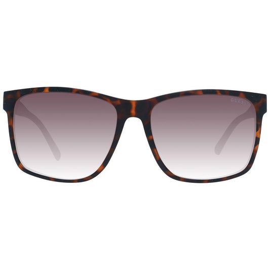 Guess brown men's sunglasses with square plastic frame and gradient lenses, offering 100% UVA & UVB protection. Style: Full-Rim.