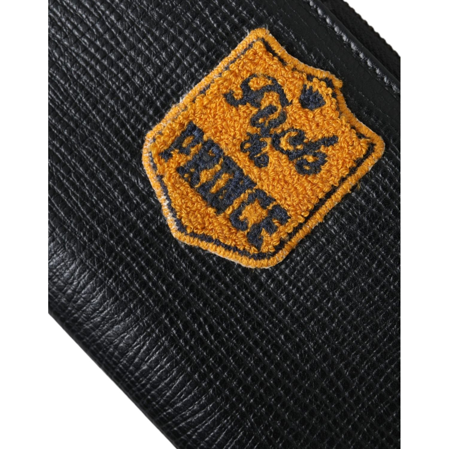 محفظة كونتيننتال من دولتشي آند غابانا مصنوعة من الجلد الأسود مع رقعة شعار