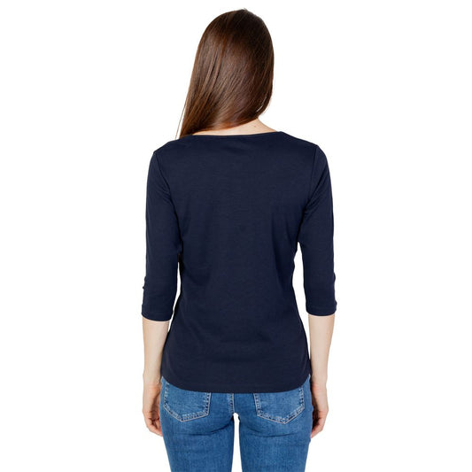 Woman wearing a Street One blue long sleeve cotton-modal T-shirt, part of the Autumn/Winter collection, viewed from the back.