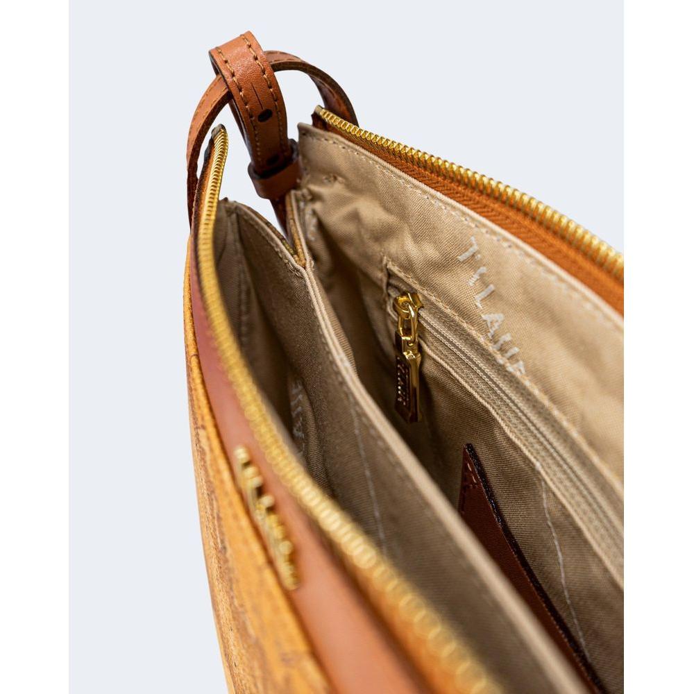 Front view with bag zipped and handles upright.