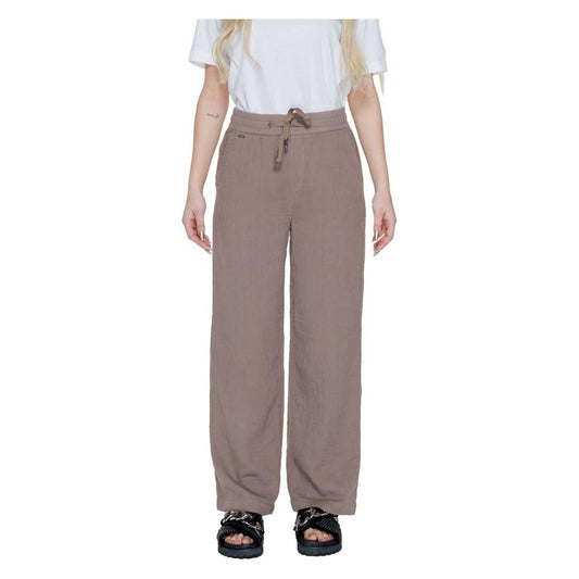 Woman wearing Street One brown cotton palazzo pants for spring/summer collection.