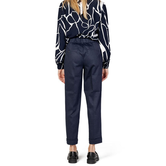 Woman wearing Street One blue viscose pants, fall/winter collection, back view, featuring a 47% viscose and 53% polyester blend.