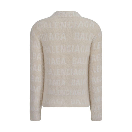 Balenciaga wool sweater with high neck and jacquard weave brand monogram, featuring ribbed cuffs and hem in off-white color, back view.