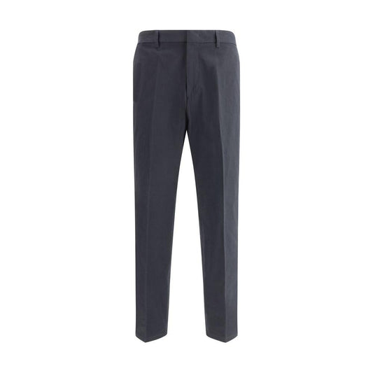 Jil Sander cropped pants with minimalist design, zipper closure, and welt pockets, featuring elasticized back for comfort.