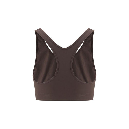 Back view of Jil Sander Sport Top featuring a cropped, stretchy design with elegant back straps and iconic monogram, enhancing style.