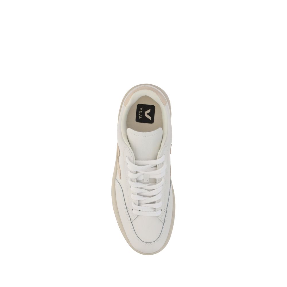 Veja White Rubber Low Top Sneakers with calf leather V-12 design, lace-up front, and iconic brand monogram and logo accents.