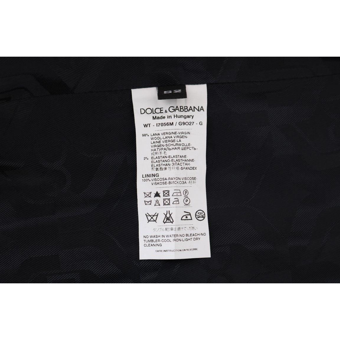 سترة أنيقة مخططة من الصوف باللون الرمادي من دولتشي آند غابانا