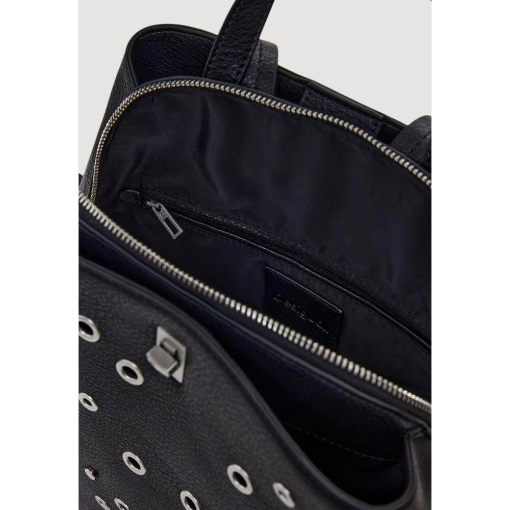 Front view with bag zipped and handles upright.