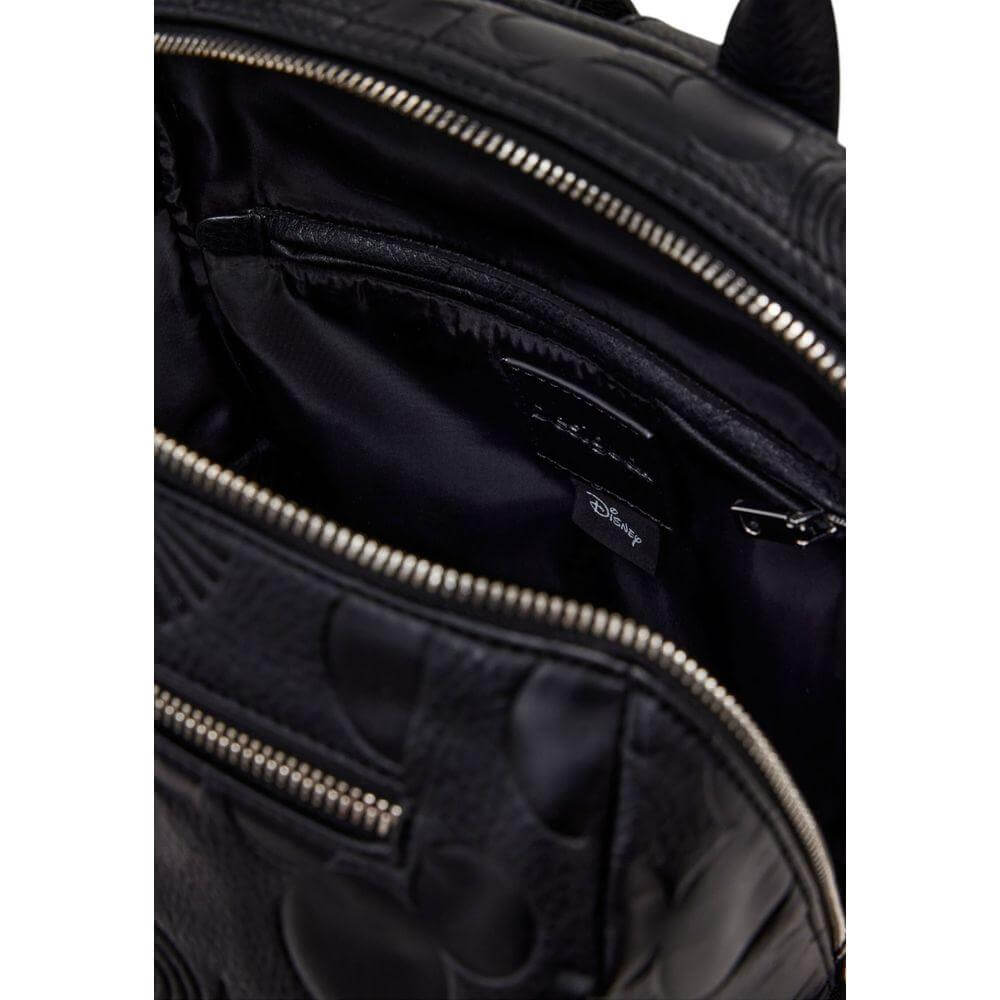 Front view with bag zipped and handles upright.