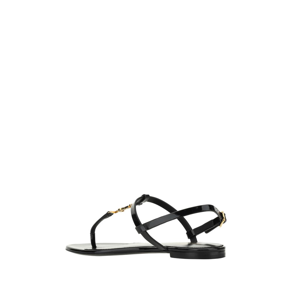 Saint Laurent Black Calf Leather Bos Taurus Flat Sandals with ankle strap closure and monogram detail, AW25 collection side view.