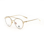 Belstaff Gold Titanium Frames with clear lenses and golden temples, featuring a minimalist design and premium craftsmanship.