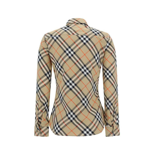 Burberry Archive Check Shirt showcasing iconic pattern, elegant collar, and flared hem for a timeless and refined style.