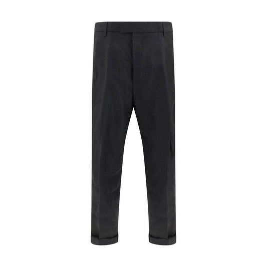 Dolce & Gabbana black linen pants with tailored design, featuring balloon leg silhouette, front zipper, and button closure.