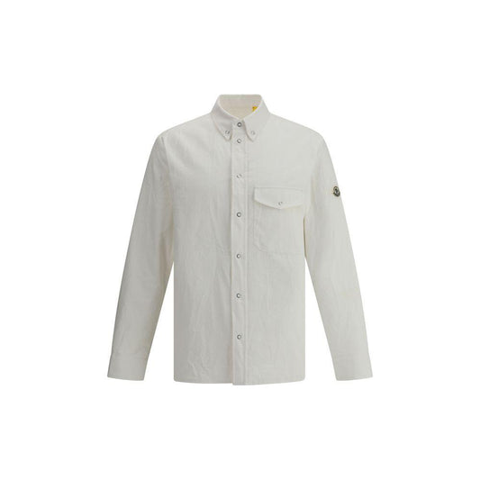 Moncler x FRGMT white shirt jacket with classic collar, snap closure, and left sleeve monogram patch, featuring boudin quilting.