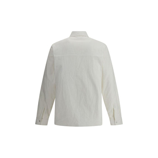 Back view of Moncler x FRGMT cotton shirt jacket featuring classic collar and snap button closure in white.