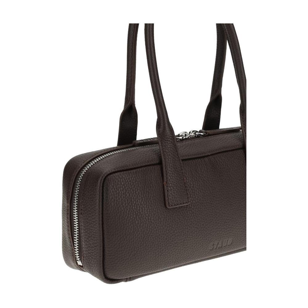 Front view with bag zipped and handles upright.