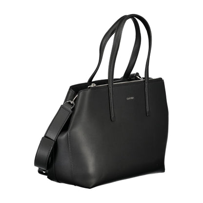 Calvin Klein Black Polyester Handbag with adjustable shoulder strap, two handles, external pocket, and logo detailing.