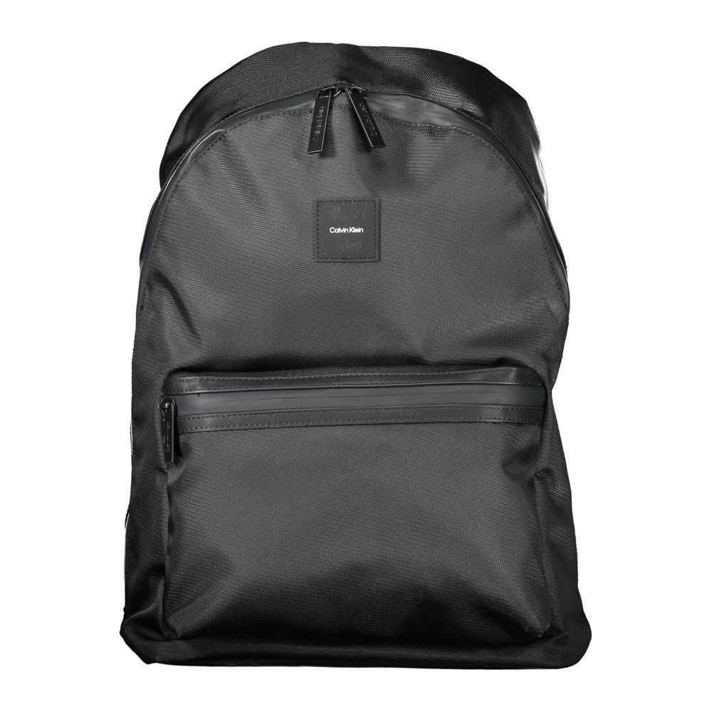 Calvin Klein Black Polyester Men Backpack with sleek design and practical features such as water-repellent exterior and laptop compartment.