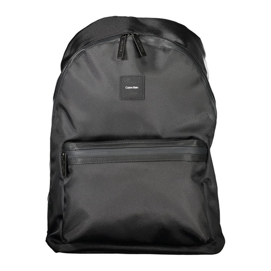 Calvin Klein Black Polyester Men Backpack with sleek design and practical features such as water-repellent exterior and laptop compartment.