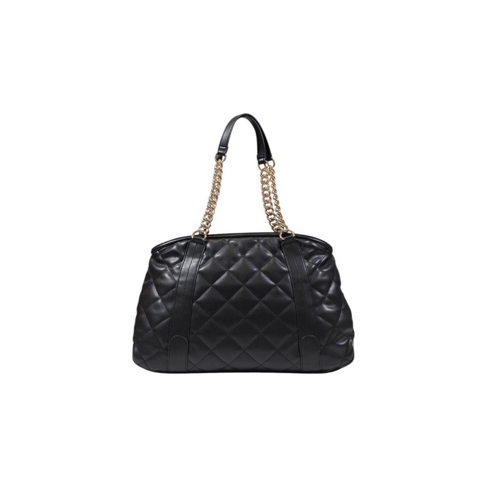Front view with bag zipped and handles upright.