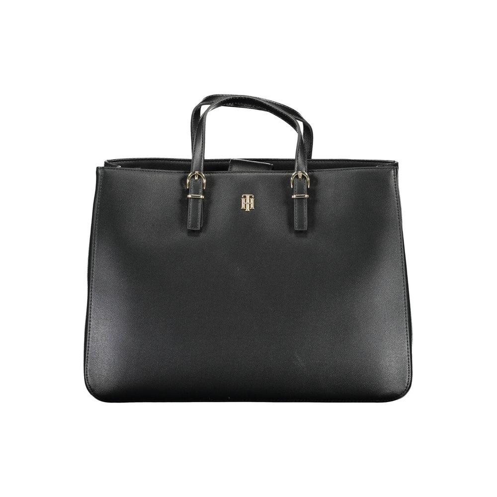 Front view with bag zipped and handles upright.