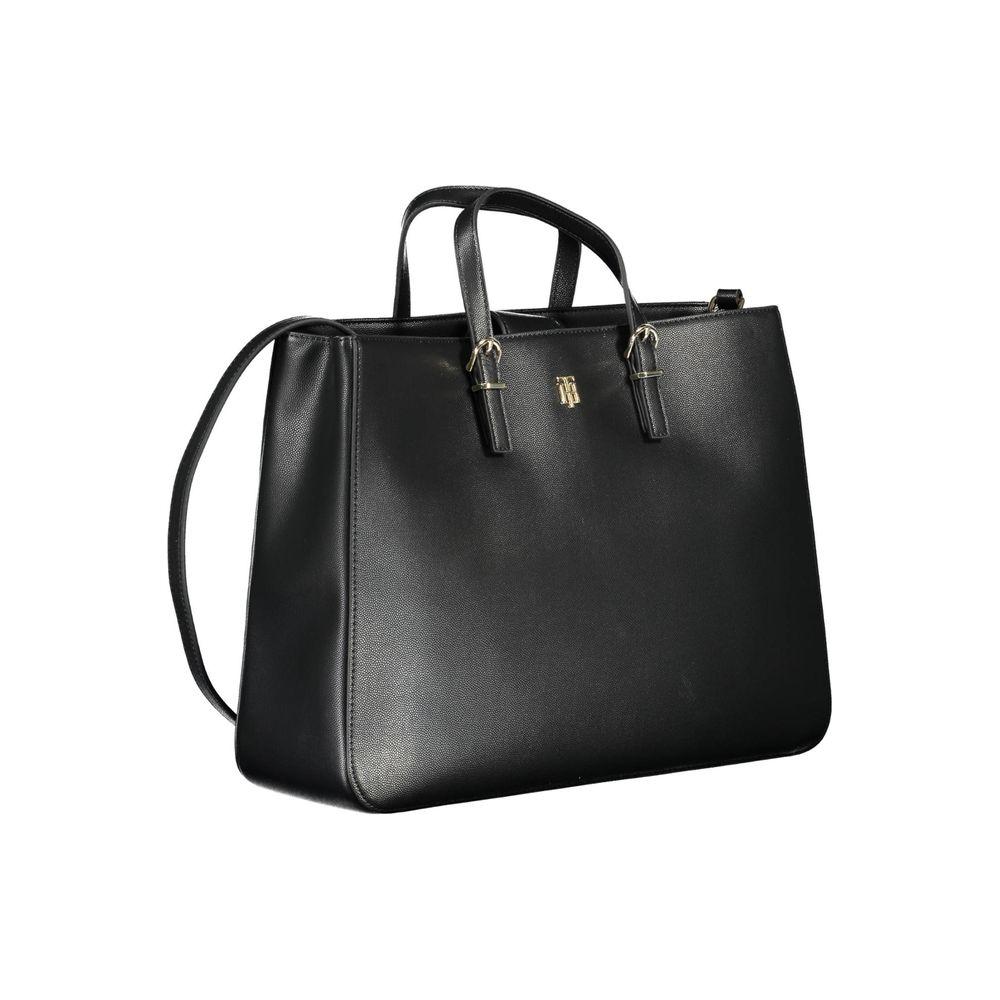 Front view with bag zipped and handles upright.