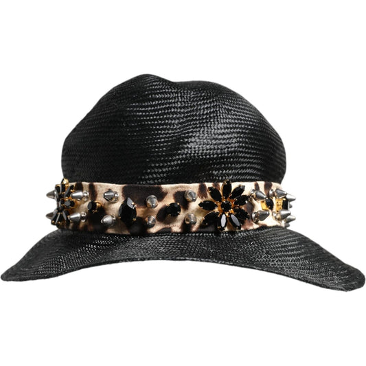 Dolce & Gabbana black wide brim hat with crystal embellishments, studs, and leopard band, made of straw and cotton.