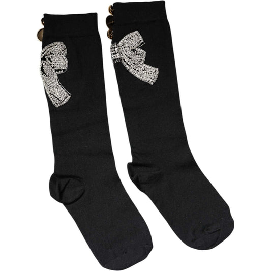 Dolce & Gabbana black knit socks with floral crystal embellishments, made from virgin wool and nylon blend, mid-calf length.