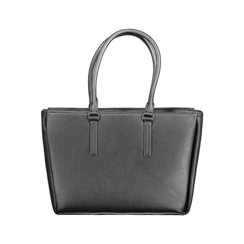 Front view with bag zipped and handles upright.