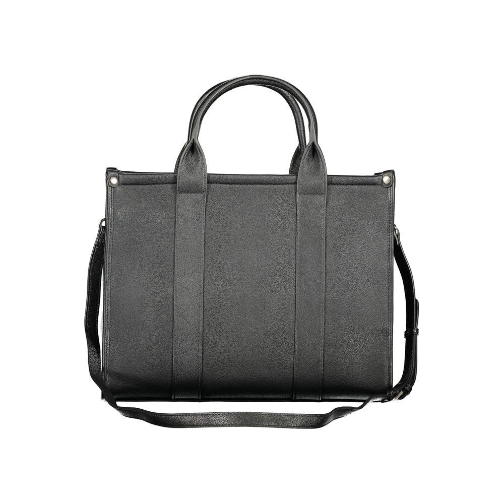 Front view with bag zipped and handles upright.