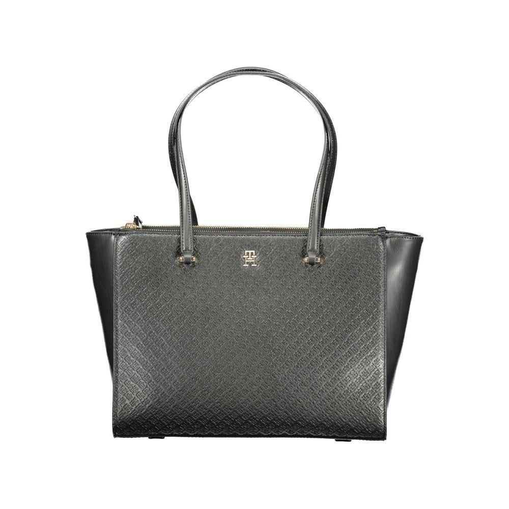 Front view with bag zipped and handles upright.