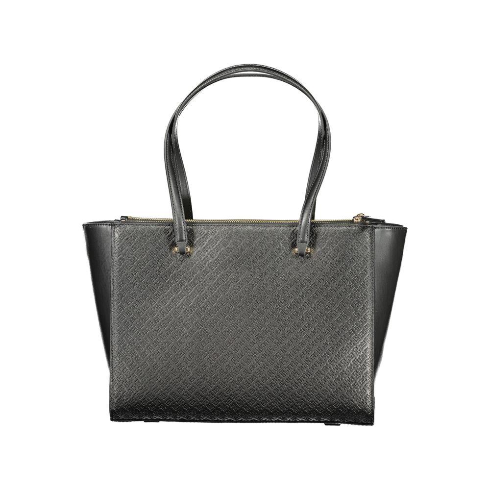 Front view with bag zipped and handles upright.