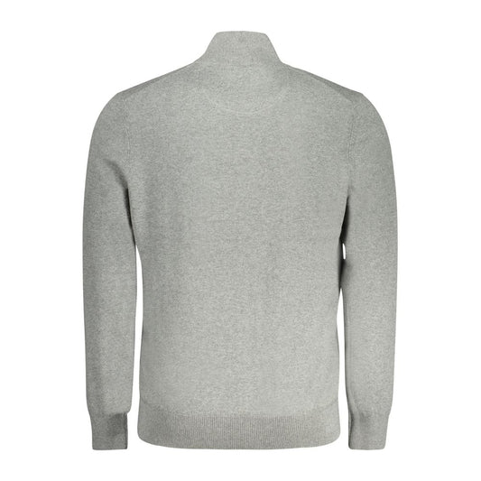 Timberland gray cotton men's sweater with long sleeves and classic logo, crafted from organic cotton for comfort and sustainability.