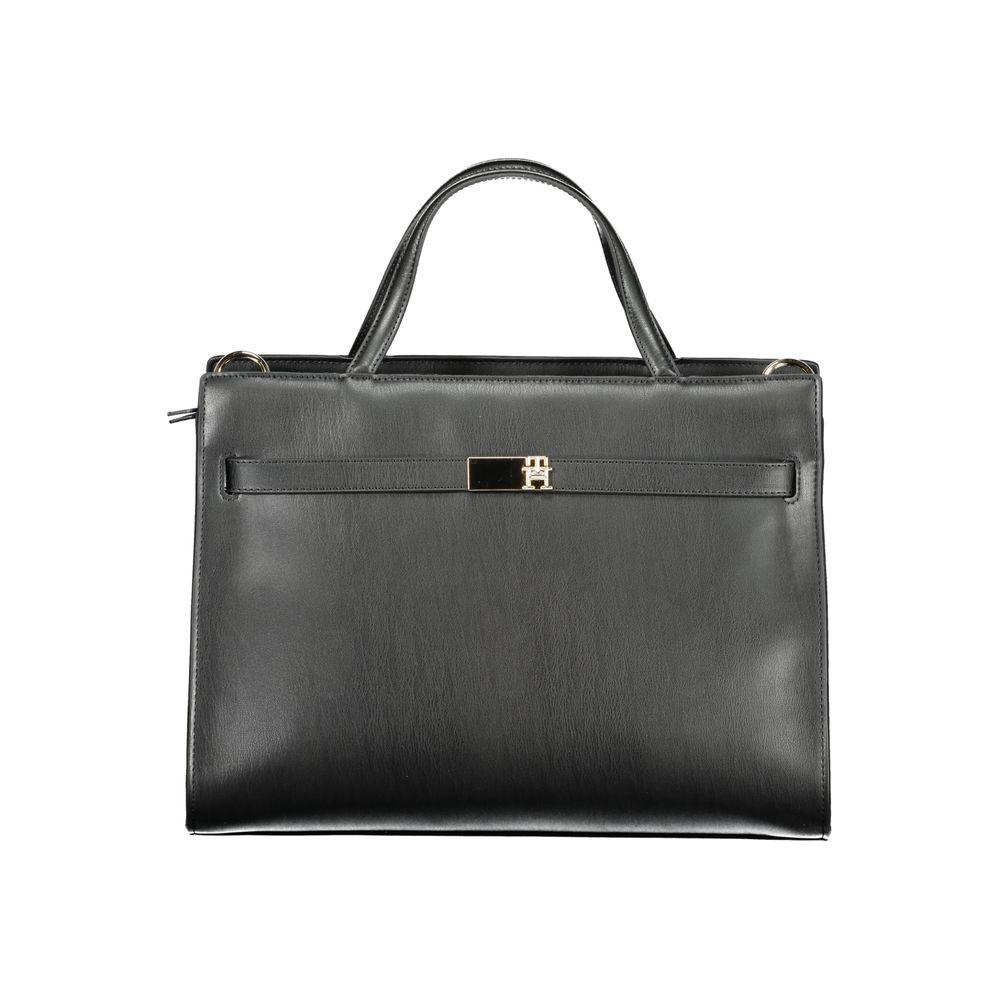 Front view with bag zipped and handles upright.
