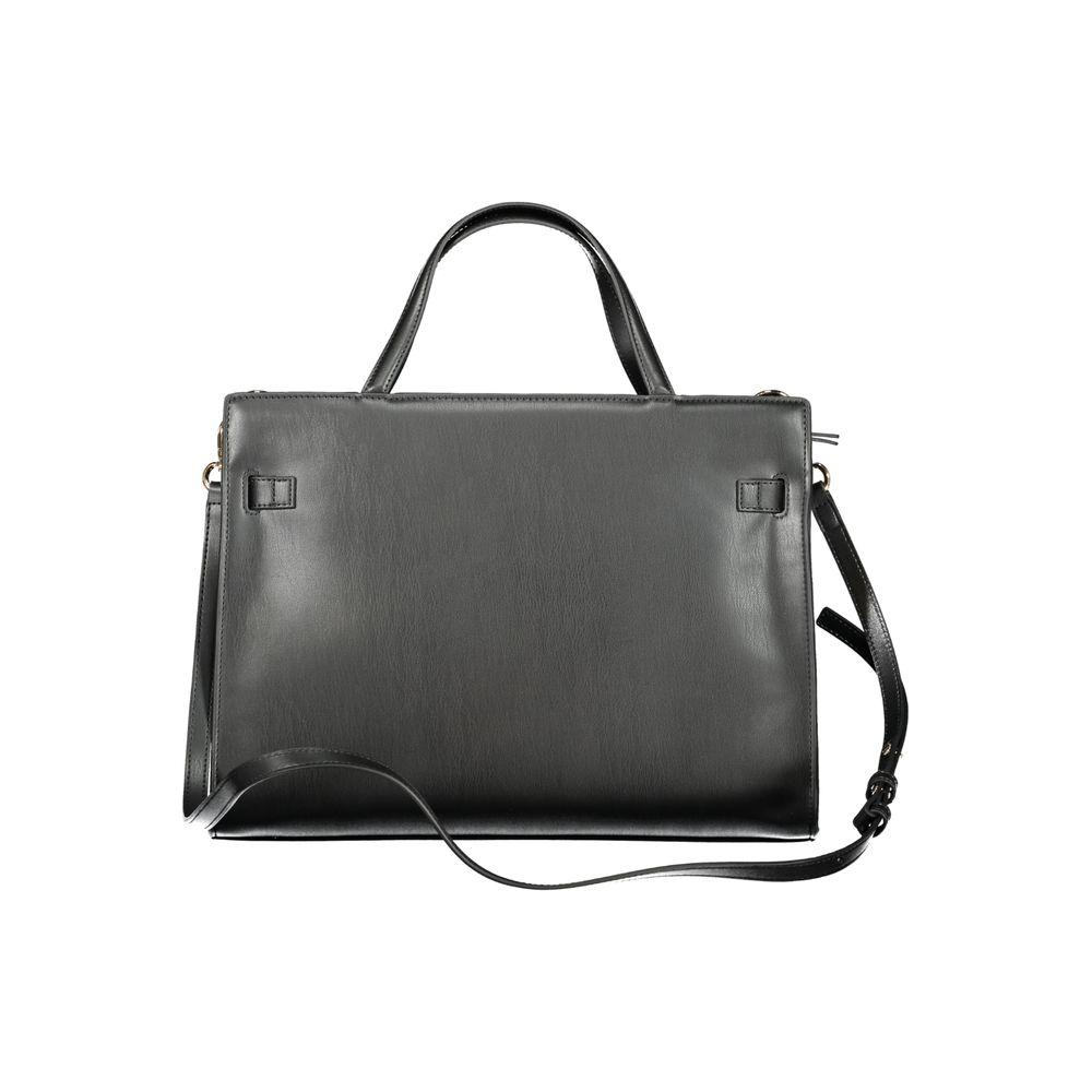 Front view with bag zipped and handles upright.