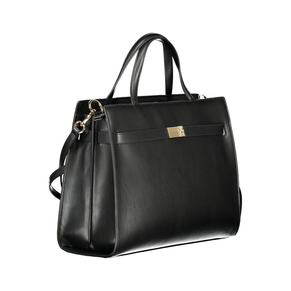 Front view with bag zipped and handles upright.