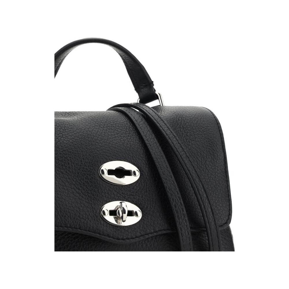 Front view with bag zipped and handles upright.