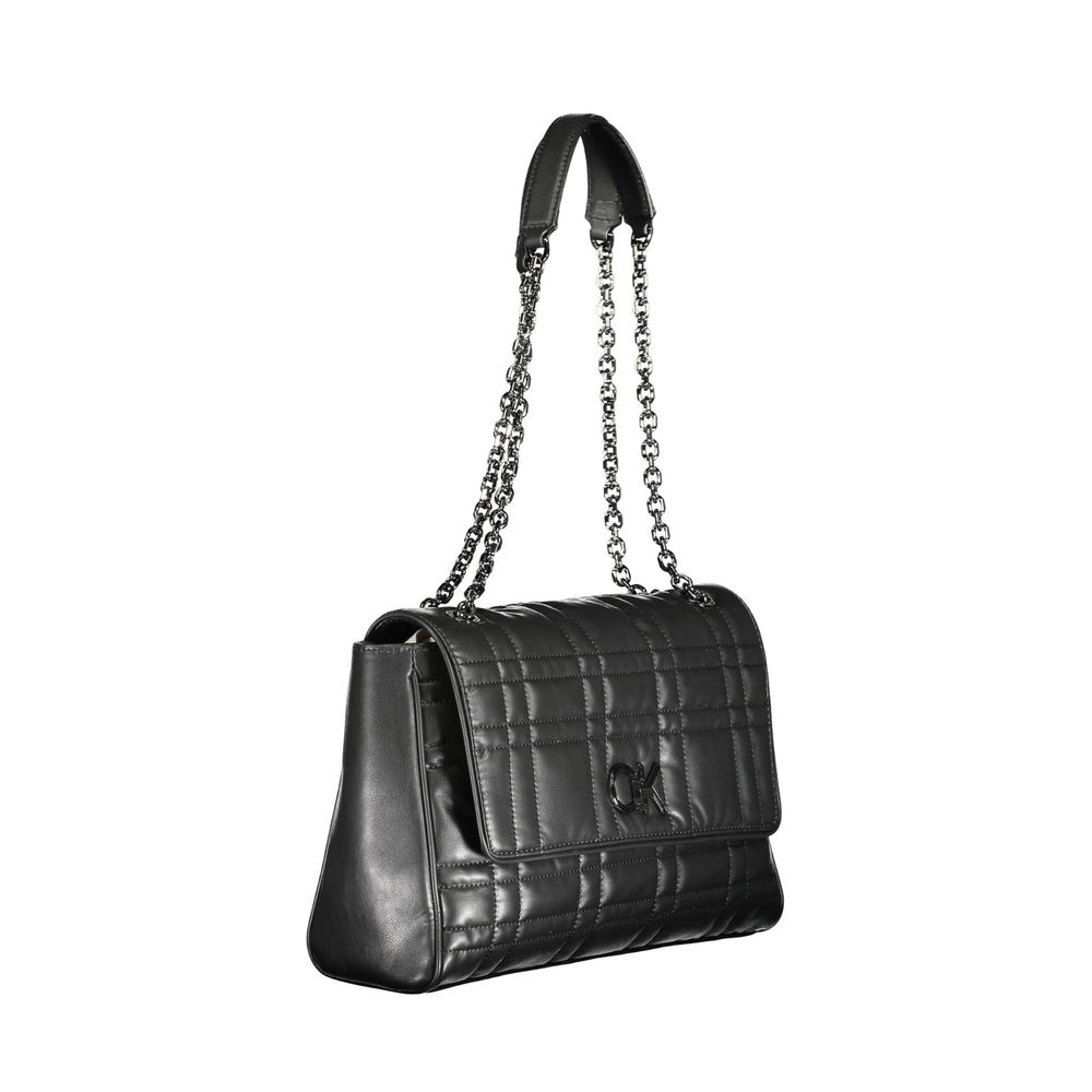 Calvin Klein Black Polyester Women Handbag with chain handles and turnbuckle closure, room for essentials in a sleek black design.