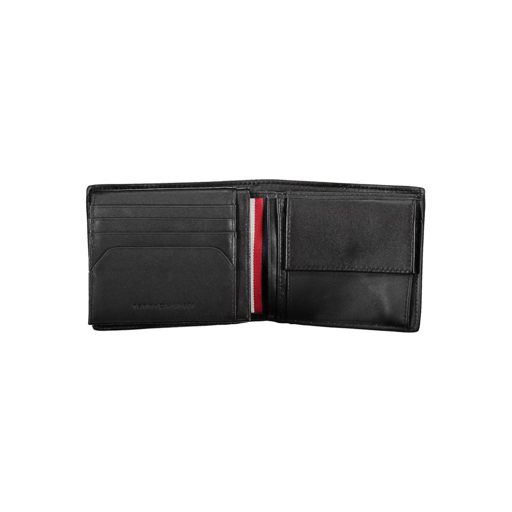 Tommy Hilfiger Black Leather Men Wallet with dual compartments and coin purse, showcasing sleek and sophisticated design for modern men.
