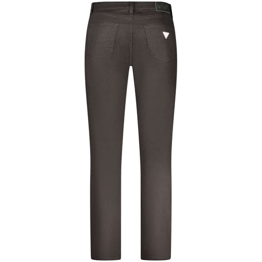 Back view of Guess black slim fit men's jeans with iconic logo and 5-pocket design, crafted from cotton blend.