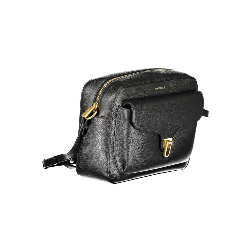 Front view with bag zipped and handles upright.