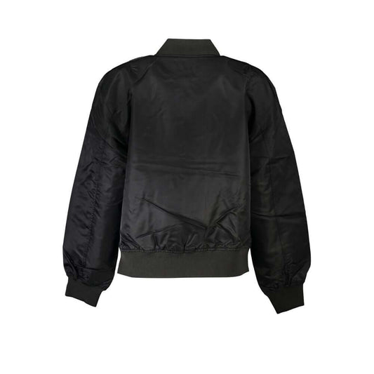 Back view of Calvin Klein long sleeve zip sports jacket, black, sleek design, highlighting durable polyamide material and stylish silhouette.