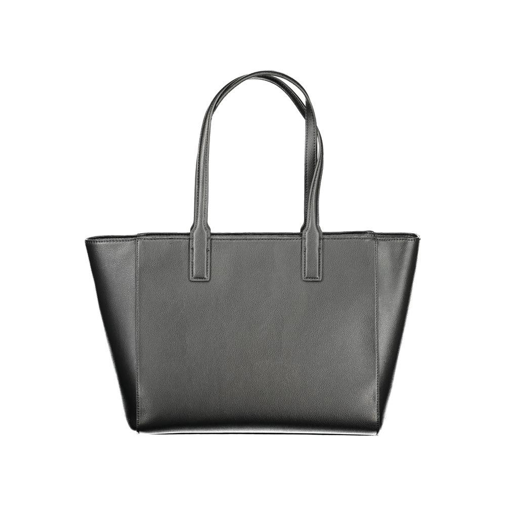 Front view with bag zipped and handles upright.