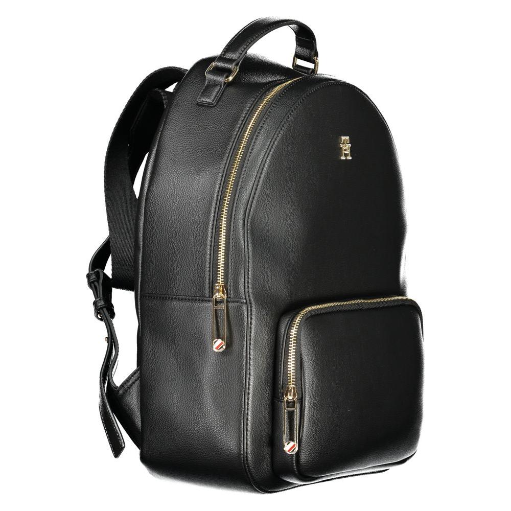 Front view with bag zipped and handles upright.