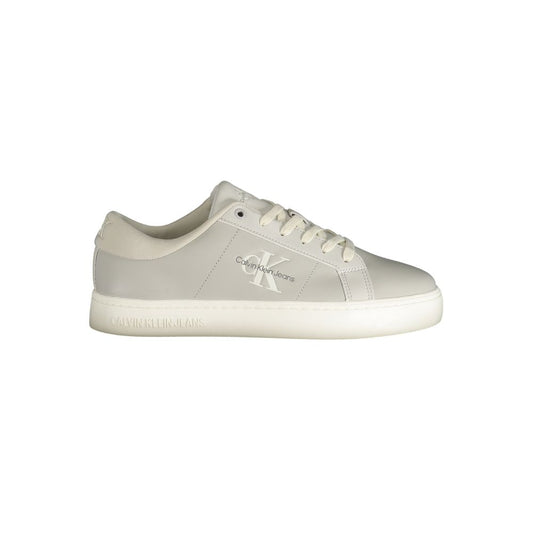Calvin Klein gray leather men's sneaker with logo, featuring recycled rubber soles and stylish lace-up design.