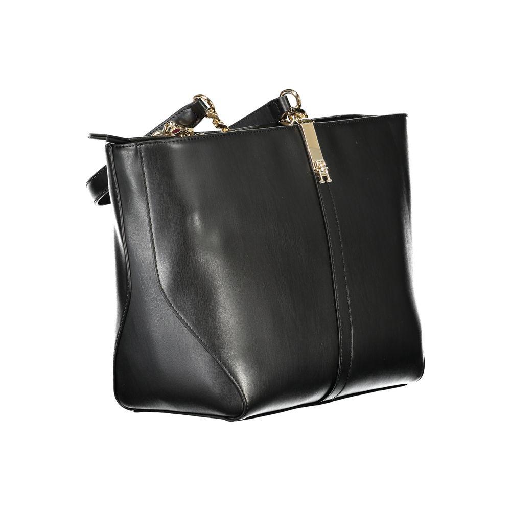 Front view with bag zipped and handles upright.